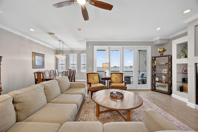 2756 Reserve Ct, Dunedin, FL 34698 - living area featuring crown molding, recessed lighting, a ceiling fan, light tile patterned floors, and built in features