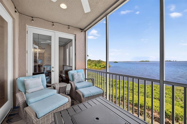 2756 Reserve Ct, Dunedin, FL 34698 - sunroom featuring a water view and a ceiling fan