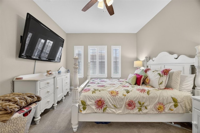 2756 Reserve Ct, Dunedin, FL 34698 - bedroom with carpet flooring and ceiling fan