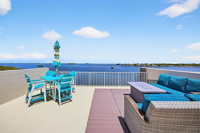 2756 Reserve Ct, Dunedin, FL 34698 - view of patio / terrace featuring a water view, outdoor dining area, and outdoor lounge area