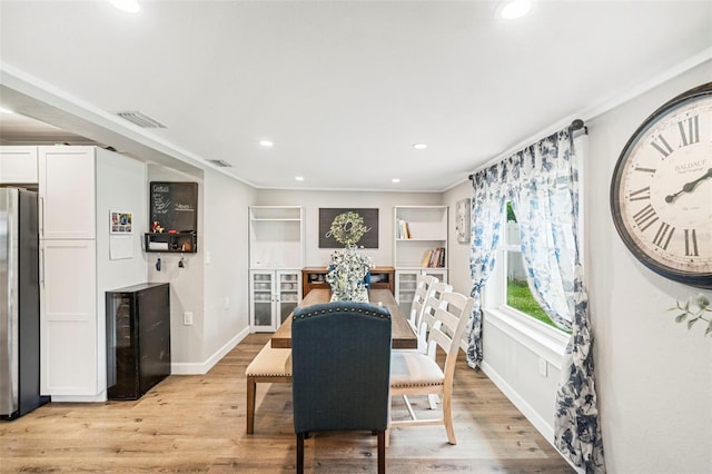 980 8th Ave NE, Largo, FL 33770 - dining room with recessed lighting and light wood finished floors