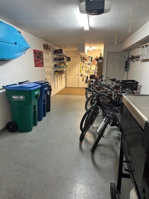 9810 Indian Key Trl Unit 85, Seminole, FL 33776 - garage featuring a garage door opener