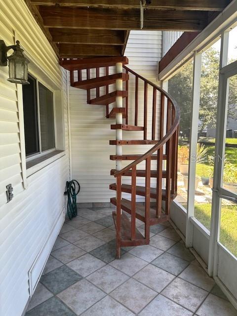 9810 Indian Key Trl Unit 85, Seminole, FL 33776 - view of unfurnished sunroom