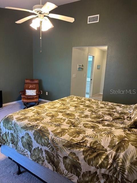 9810 Indian Key Trl Unit 85, Seminole, FL 33776 - carpeted bedroom with ceiling fan
