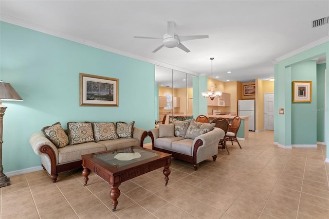 2468 Magnolia Cir, North Port, FL 34289 - living area with ornamental molding, a ceiling fan, a chandelier, light tile patterned floors, and recessed lighting