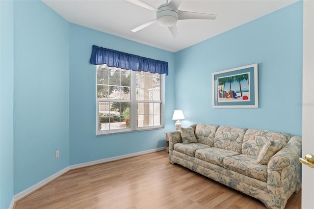 2468 Magnolia Cir, North Port, FL 34289 - living area with wood finished floors and ceiling fan