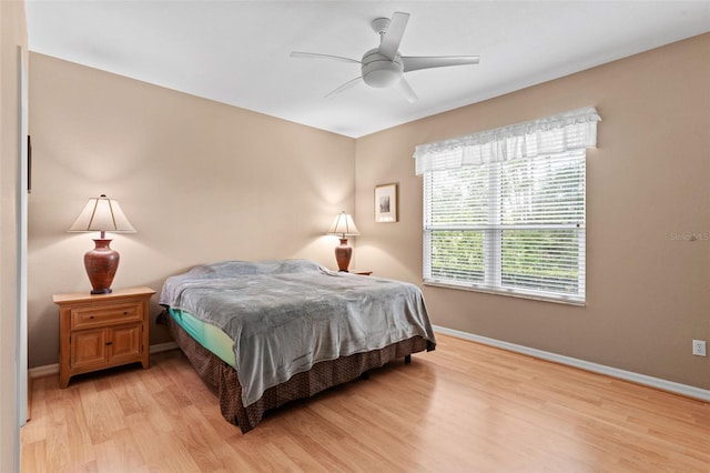 2468 Magnolia Cir, North Port, FL 34289 - bedroom featuring light wood-type flooring and a ceiling fan