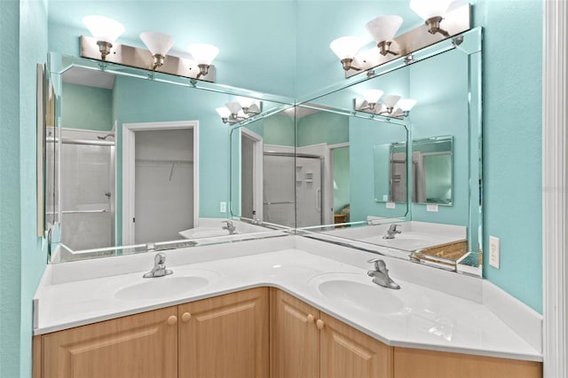 2468 Magnolia Cir, North Port, FL 34289 - bathroom with double vanity, a shower stall, and a spacious closet