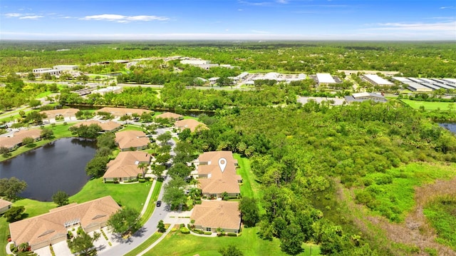 2468 Magnolia Cir, North Port, FL 34289 - aerial view of residential area featuring a large body of water and a heavily wooded area