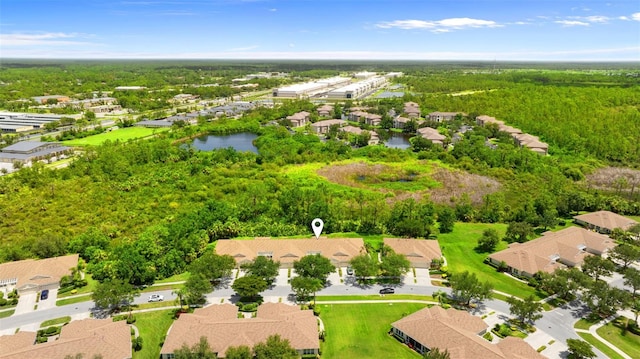 2468 Magnolia Cir, North Port, FL 34289 - aerial view of residential area with a forest and a nearby body of water