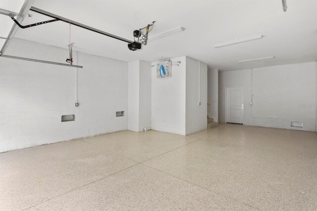 11605 1st St E Unit 3, Treasure Island, FL 33706 - garage with a garage door opener