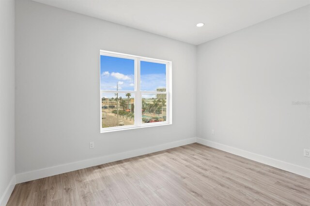 11605 1st St E Unit 3, Treasure Island, FL 33706 - spare room with light wood-style flooring and recessed lighting