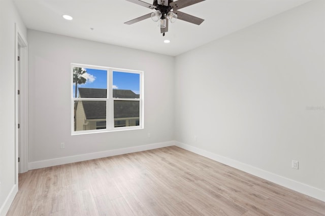 11605 1st St E Unit 3, Treasure Island, FL 33706 - unfurnished room with light wood-style flooring, ceiling fan, and recessed lighting