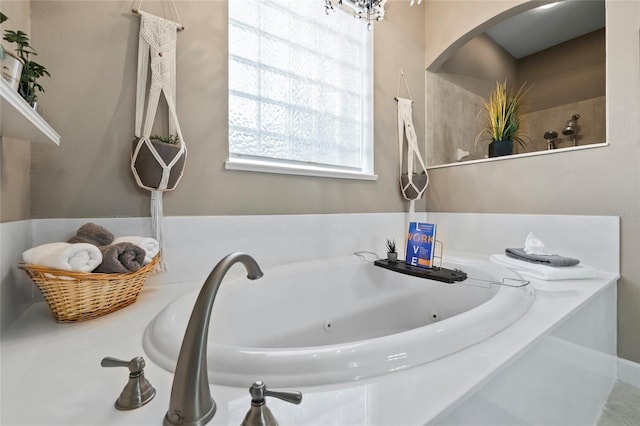 1872 Eloise Cove Dr, Winter Haven, FL 33884 - bathroom featuring a whirlpool tub and a sink
