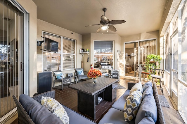 1872 Eloise Cove Dr, Winter Haven, FL 33884 - sunroom / solarium featuring outdoor lounge area, a ceiling fan, and plenty of natural light