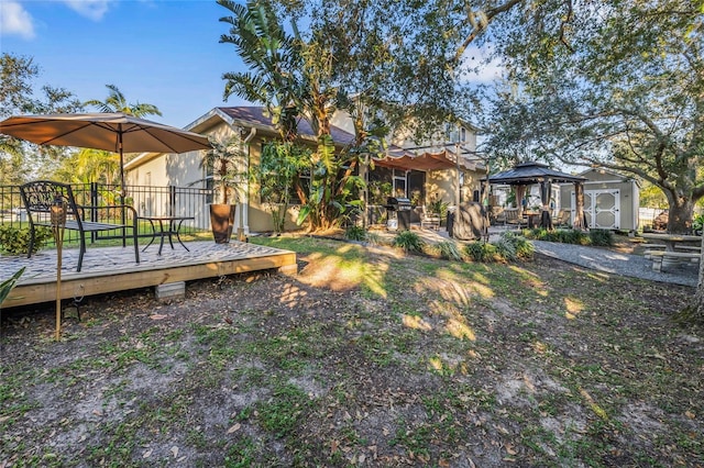 1872 Eloise Cove Dr, Winter Haven, FL 33884 - view of yard featuring a gazebo and a deck