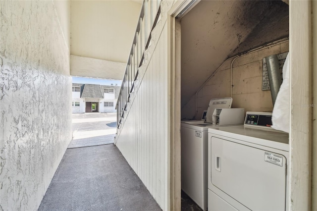 3415 Tricon Ln Unit 13, Holiday, FL 34691 - laundry area with separate washer and dryer and dark carpet