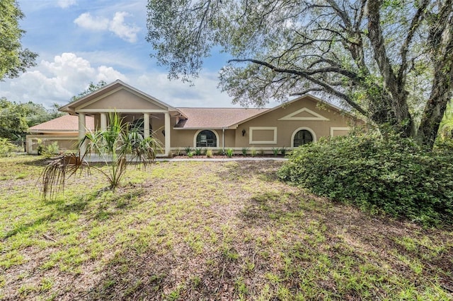 3685 N Palomino Ter, Beverly Hills, FL 34465 - ranch-style home featuring stucco siding and a front yard