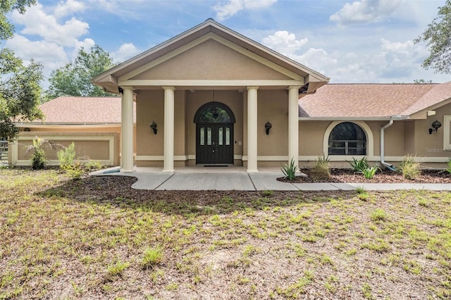 3685 N Palomino Ter, Beverly Hills, FL 34465 - view of front of house featuring stucco siding and a front yard
