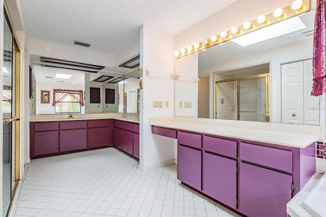 3685 N Palomino Ter, Beverly Hills, FL 34465 - full bath featuring vanity, tile patterned floors, and a shower with door