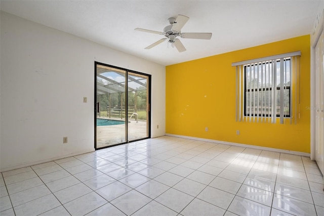 3685 N Palomino Ter, Beverly Hills, FL 34465 - spare room with healthy amount of natural light, light tile patterned floors, and ceiling fan