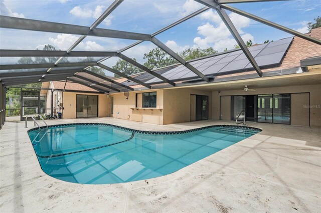 3685 N Palomino Ter, Beverly Hills, FL 34465 - swimming pool with a patio area, a ceiling fan, and glass enclosure