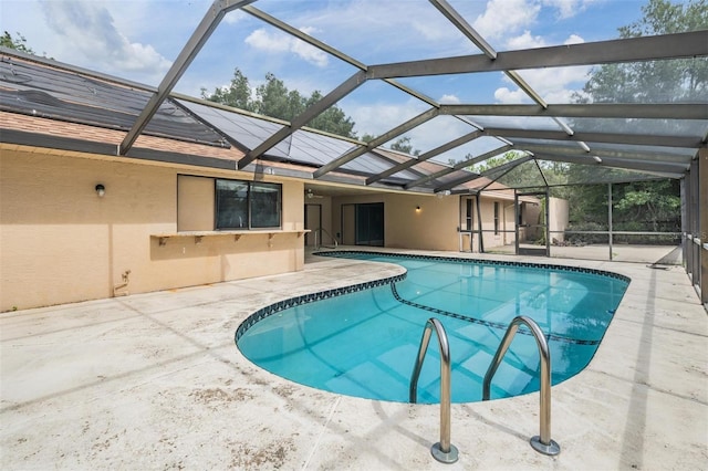 3685 N Palomino Ter, Beverly Hills, FL 34465 - outdoor pool with a patio and glass enclosure