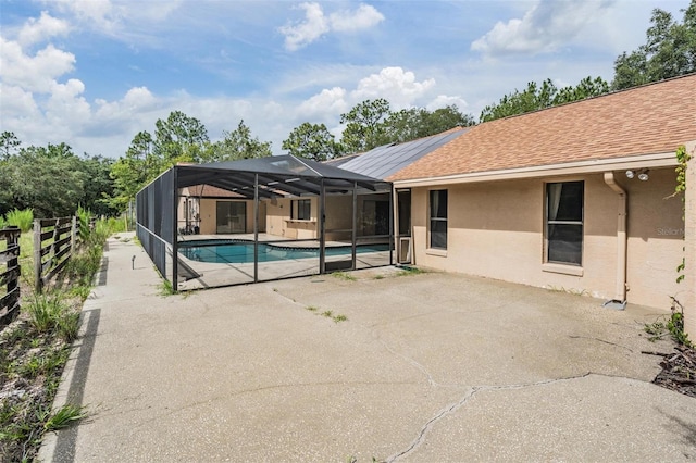 3685 N Palomino Ter, Beverly Hills, FL 34465 - view of swimming pool with a patio area and glass enclosure