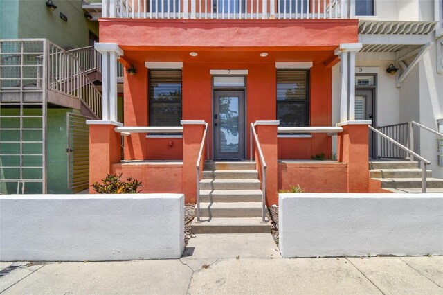 1914 E 4th Ave Unit 2, Tampa, FL 33605 - doorway to property featuring stucco siding
