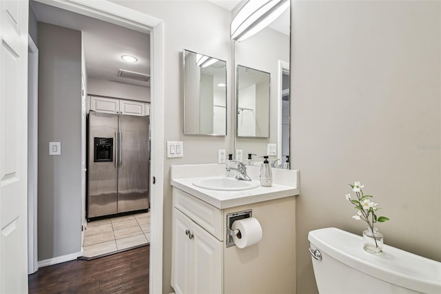 1914 E 4th Ave Unit 2, Tampa, FL 33605 - bathroom featuring vanity and wood finished floors