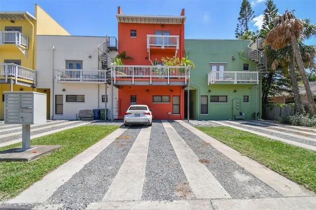 1914 E 4th Ave Unit 2, Tampa, FL 33605 - view of property with driveway and stucco siding