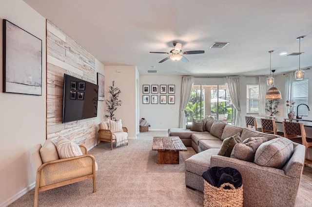 6307 Shadowlake Dr, Apollo Beach, FL 33572 - carpeted living area featuring ceiling fan and baseboards