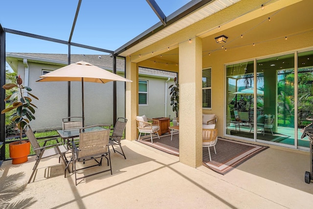 6307 Shadowlake Dr, Apollo Beach, FL 33572 - view of patio with outdoor dining space and glass enclosure