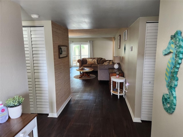 6356 7th Ave W Unit 6356, Bradenton, FL 34209 - hallway with baseboards and wood finished floors