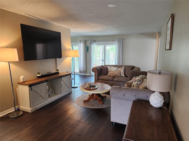6356 7th Ave W Unit 6356, Bradenton, FL 34209 - living area with a textured ceiling and dark wood-style floors