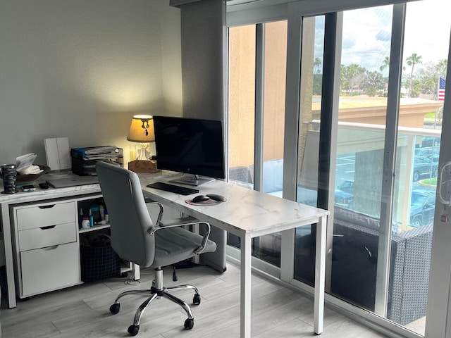 880 Mandalay Ave Unit C206, Clearwater, FL 33767 - home office featuring light wood-type flooring
