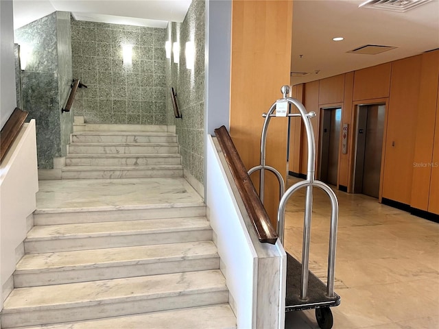 880 Mandalay Ave Unit C206, Clearwater, FL 33767 - stairway featuring elevator