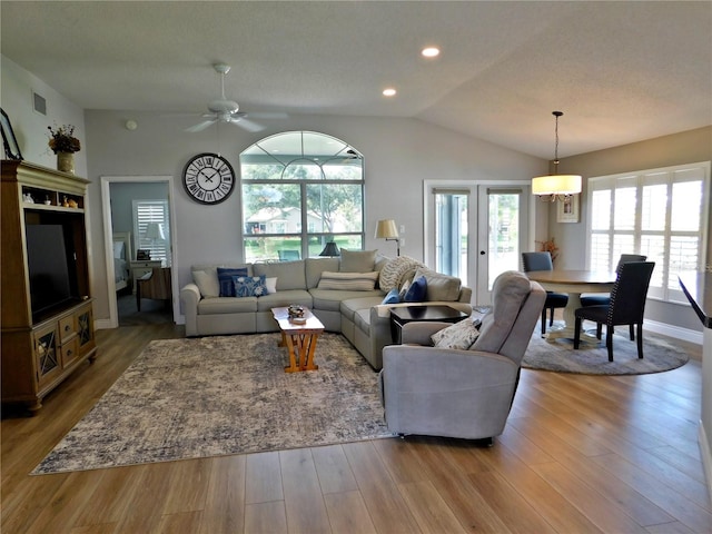 11802 Aintree Ct, Trinity, FL 34655 - living room with plenty of natural light, lofted ceiling, ceiling fan, wood finished floors, and recessed lighting