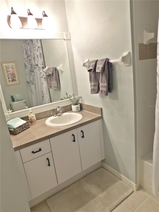 11802 Aintree Ct, Trinity, FL 34655 - full bath featuring vanity, tile patterned floors, and shower / bathtub combination with curtain