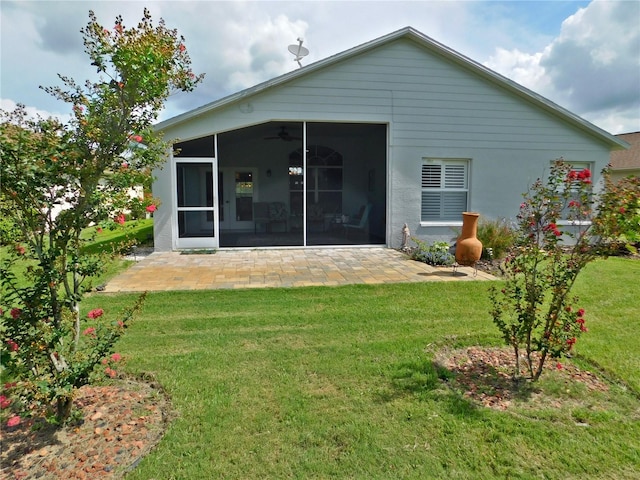 11802 Aintree Ct, Trinity, FL 34655 - rear view of property featuring a sunroom, a patio, a yard, and ceiling fan