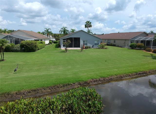 11802 Aintree Ct, Trinity, FL 34655 - view of grassy yard with a sunroom