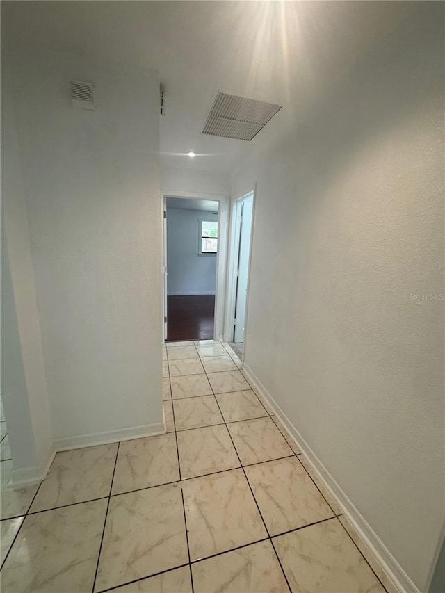 6133 Arthur Ave, New Port Richey, FL 34653 - corridor featuring baseboards