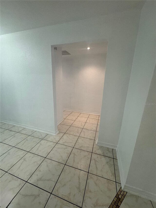 6133 Arthur Ave, New Port Richey, FL 34653 - corridor featuring baseboards