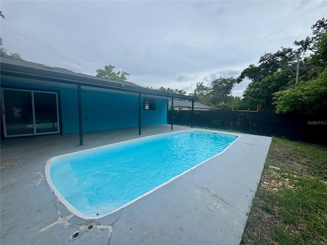 6133 Arthur Ave, New Port Richey, FL 34653 - view of swimming pool with a patio area