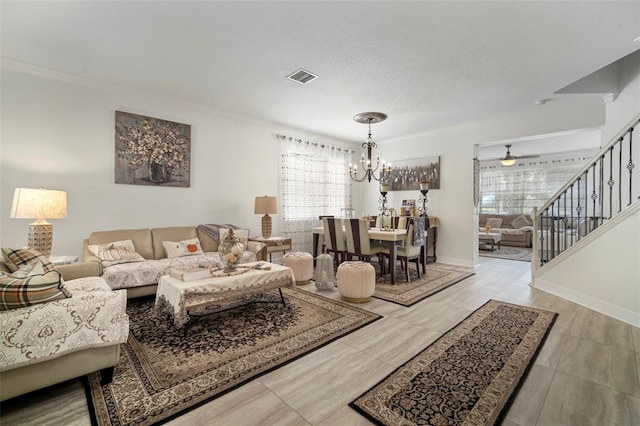 11132 Running Pine Dr, Riverview, FL 33569 - tiled living area with a chandelier, healthy amount of natural light, stairs, and ornamental molding