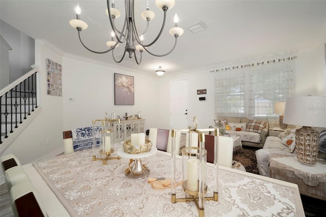 11132 Running Pine Dr, Riverview, FL 33569 - dining area with stairway, a chandelier, and crown molding