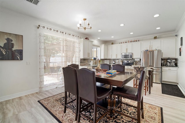 11132 Running Pine Dr, Riverview, FL 33569 - dining room with crown molding, a chandelier, recessed lighting, and light tile patterned flooring
