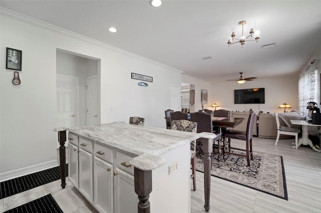 11132 Running Pine Dr, Riverview, FL 33569 - kitchen with open floor plan, a chandelier, a ceiling fan, ornamental molding, and recessed lighting