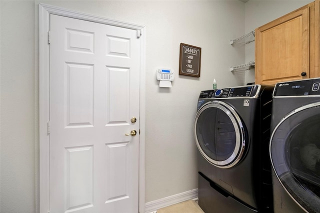 11132 Running Pine Dr, Riverview, FL 33569 - washroom featuring washing machine and clothes dryer and cabinet space