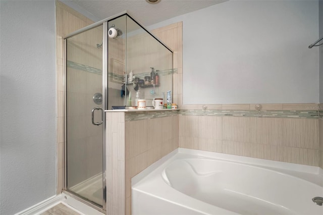 11132 Running Pine Dr, Riverview, FL 33569 - full bathroom featuring a bath and a shower stall